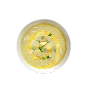 Cheese soup with chicken, potatoes and turmeric. Top view