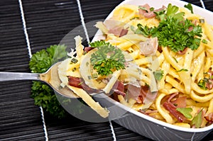 Cheese Spaetzle on black tablecloth