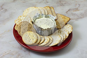 Cheese spread and plate of crackers