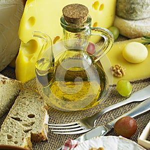 cheese still life with olive oil