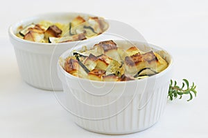 Cheese-topped dish of zucchini and feta photo