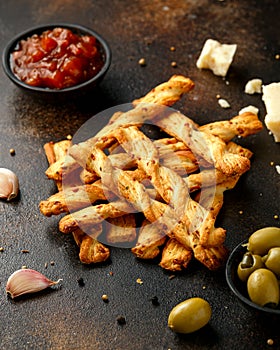 Cheese Twist Sticks with garlic, parmesan and chutney. party food snacks