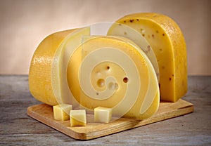 Cheese on wooden cutting board