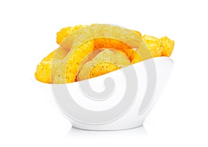 Cheese yellow corn snacks in white bowl
