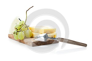 Cheeseboard of hard and blue cheese with grapes