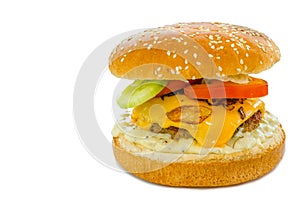 Cheeseburger with bacon and tartar sauce and garden salad