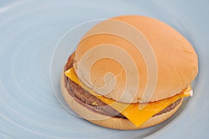 Cheeseburger with cheese and ketchup photo