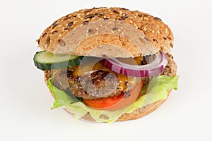 Cheeseburger with cucumber and tomato