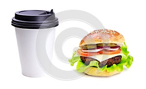 Cheeseburger and cup of coffee isolated on a white background. Hamburger with cheese. Burger isolated. Tasty dinner