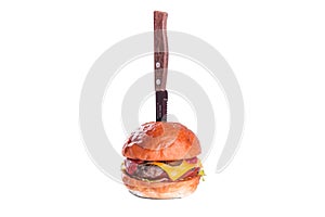 Cheeseburger with double meat cutlet, gamburger isolated on white background. Restaurant dish. Tasty Gamburger with beef