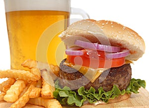 Cheeseburger with french fries and beer