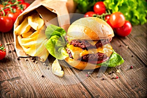 Cheeseburger with fresh salad and french fries