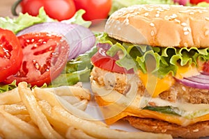 Cheeseburger with fries and ingredients