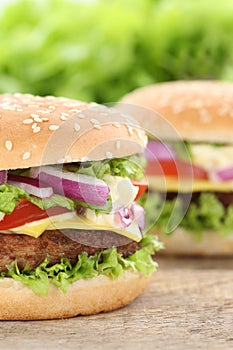 Cheeseburger hamburger closeup close up beef tomatoes lettuce ch