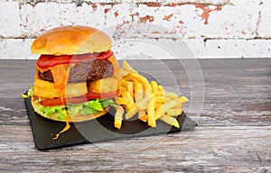 Cheeseburger With Hash Browns And French Fries