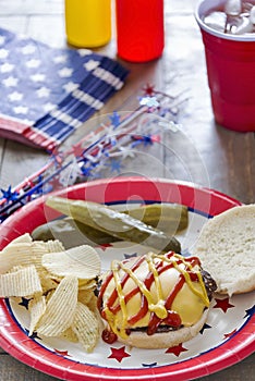 Cheeseburger at a patriotic themed cookout