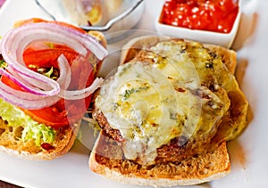 Cheeseburger and salad