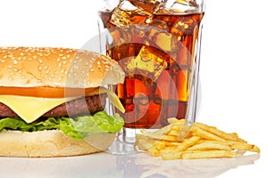 Cheeseburger, soda and french fries