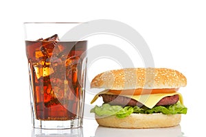 Cheeseburger and soda glass