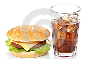 Cheeseburger and soda glass