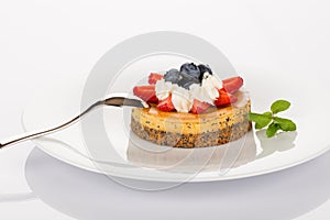 Cheesecake, blueberries and strawberries