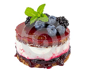 Cheesecake with fresh blueberries and blackberries, blueberry jam and jelly