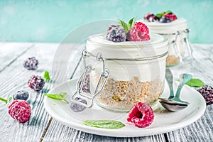 Cheesecake in portioned jars with summer berries