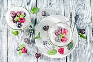 Cheesecake in portioned jars with summer berries