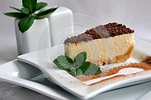 Cheesecake slice on a white plate