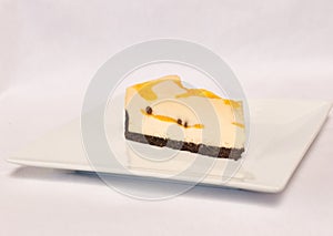 Cheesecake slice on white plate , isolated on white background