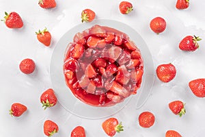 Cheesecake with strawberry and fresh berries on gray background