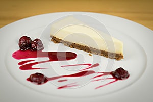 Cheesecake from white chocolate on white plate