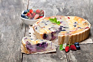 Cheesecake with wild forest berries. Summer dessert
