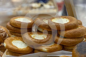 Cheesecakes in a store window. Traditional delicious pastries. Close-up