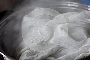 Cheesecloth in steam pot photo