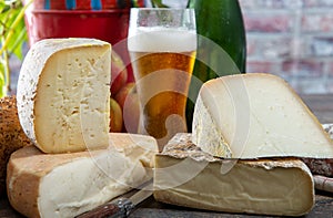 Cheeses and Tomme de Savoie with beer, French cheese Savoy, french Alps France