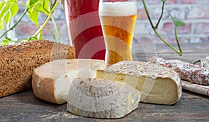 Cheeses and Tomme de Savoie with beer, French cheese Savoy, french Alps France