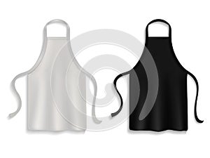 Chef apron. Realistic kitchen uniform, black and white cooking cloth, clothes for kitchener, restaurant or cafe waiter photo