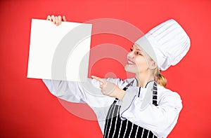 Chef author culinary book. Cooking food and culinary as hobby. Woman reading cook book in kitchen. Tips and advice