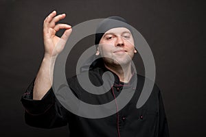 Chef in black uniforms