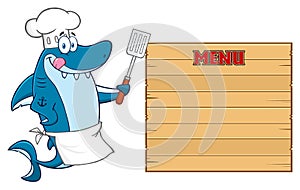 Chef Blue Shark Cartoon Character Licking His Lips And Holding A Spatula To Wooden Blank Board With Text Menu