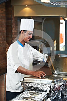 Chef boiling a soup