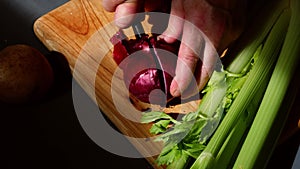 Chef chopping fresh vegetables ingredients prepared on chopping board