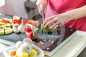 Chef is chopping vegetables