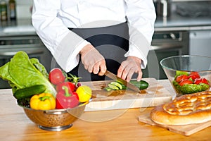 Chef chopping vegetables