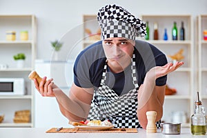 The chef cook cooking a meal breakfast dinner in the kitchen