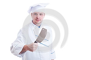Chef or cook holding a big knife called cleaver