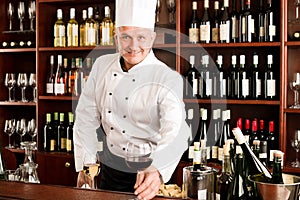 Chef cook smiling serve wine glass restaurant