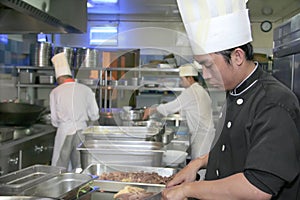 Chef cooking at kitchen