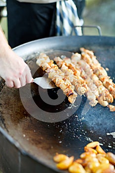 Chef cooking meat